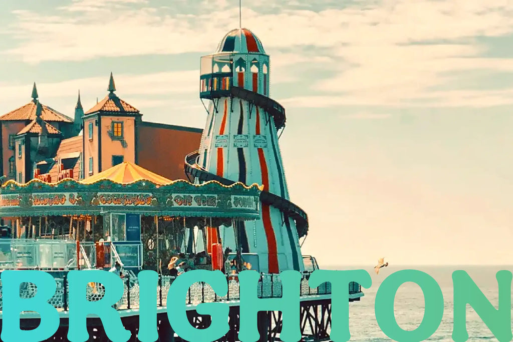 Brighton Pier (UK) carnival rides with the sea in the background and the work Brighton in a blue/green gradient overlaying the image.